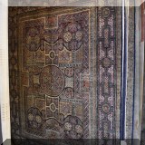 R21. 100% Wool handwoven rug with Celtic knot design. Made in India. 7'111” x 10'4” 